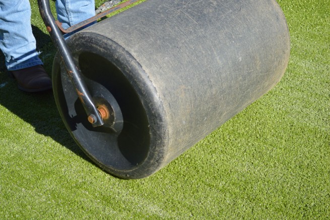 Naperville artificial grass installation - top layer rolled